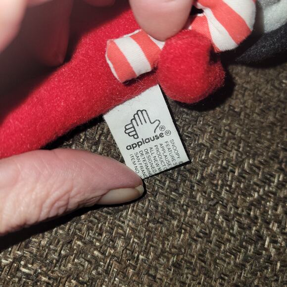 Snoopy Holding Candy Cane in Christmas PJs Plush Ornament - Picture 3 of 3